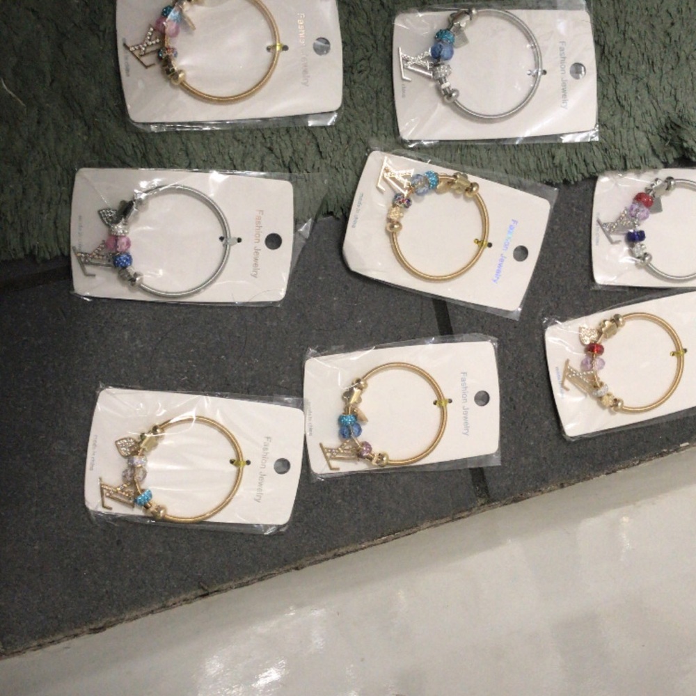 Gold and Silver Charm Bracelets